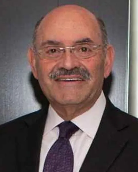 Allen Weisselberg in a suit and tie in a Bloomberg Markets profile portrait.