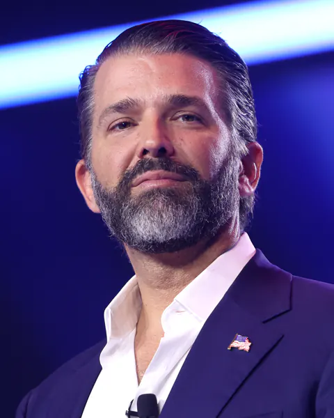 Donald Trump Jr. speaking at a public event in 2025.