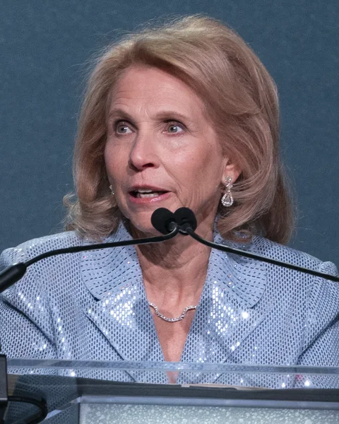 Shari Redstone speaking at a lectern.