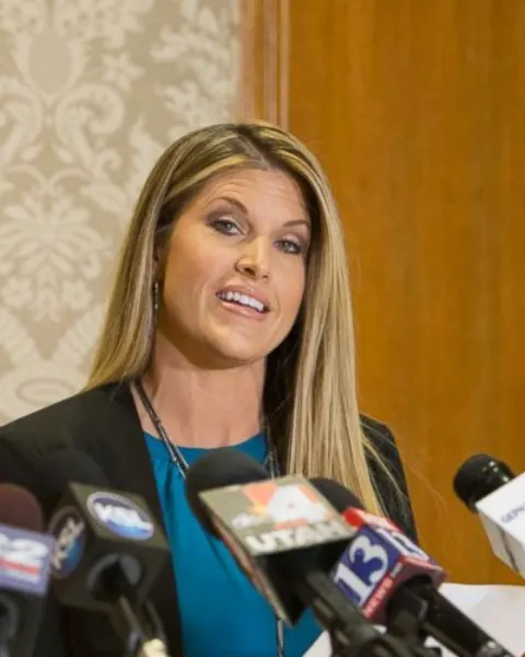 Temple Taggart McDowell speaking at a 2016 press conference.
